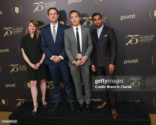 Official recipients for "Master of None", Amy Williams, Igor Srubschic, co-crerators/executive producers Alan Yang and Aziz Ansari pose for...