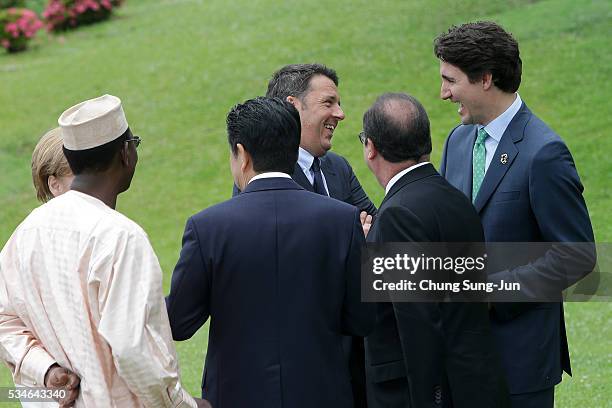 Chad President Idriss Deby Itno, Japanese Prime Minister Shinzo Abe, Italian Prime Minister Matteo Renzi, French President Francois Hollande and...
