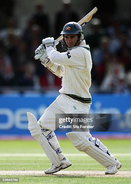 Justin Langer of Australia looks to play through the covers during day two of the Fourth npower Ashes Test match between England and Australia at...