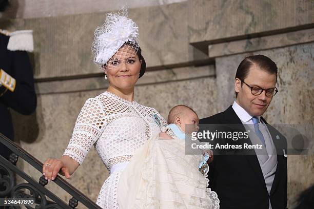 Crown Princess Victoria of Sweden and Prince Oscar of Sweden and Prince Daniel of Sweden are seen at Royal Palace of Stockholm for the Christening of...