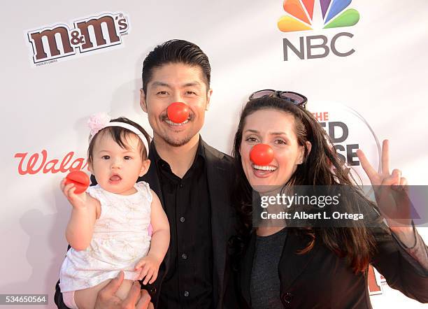 Actor Brian Tee, daughter Madelyn Sky Tee and actress Mirelly Taylor arrive for The Red Nose Day Special On NBC at Alfred Hitchcock Theater at...