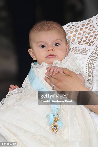 Crown Princess Victoria of Sweden holds Prince Oscar, Duke of Skane after the ceremony at Royal Palace of Stockholm for the Christening of Prince...