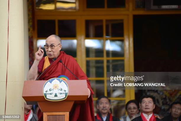 Tibetan Spiritual leader the Dalai Lama speaks during the swearing-in ceremony of re-elected Sikyong Lobsang Sangay at the Tsuglakhang Temple in...