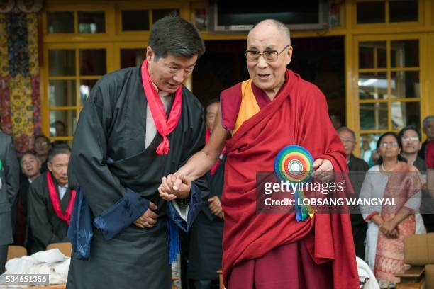 Tibetan spiritual leader His Holiness the Dalai Lama and the re-elected Sikyong (Prime Minister of the Central Tibetan Administration Lobsang Sangay...