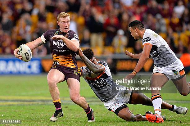 Jack Reed of the Broncos attempts to break away from the defence during the round 12 NRL match between the Brisbane Broncos and the Wests Tigers at...