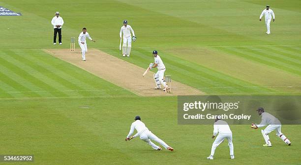 England captain Alastair Cook is caught out by Dimuth Karunaratne of Sri Lanka during day one of the 2nd Investec Test match between England and Sri...