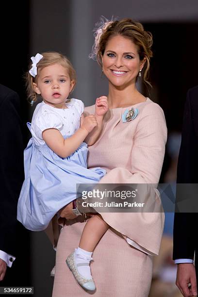 Princess Madeleine of Sweden and Princess Leonore of Sweden attend the christening of Prince Oscar of Sweden at the Royal Palace in Stockholm on May...