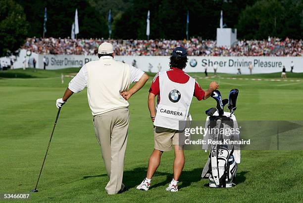 Angel Cabrera of Argentina waits to play his second shot on the par five 18th hole during the second round of the BMW International Open Golf at the...