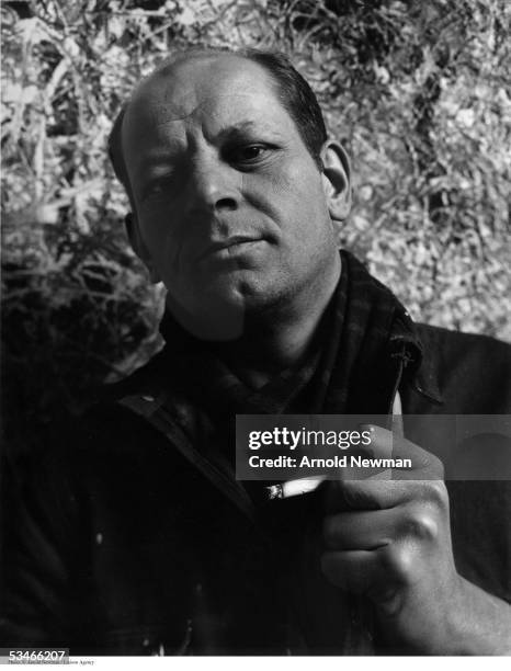 Portrait of Abstract Expressionist painter Jackson Pollock in his Long Island studio January 3, 1949 in East Hampton, New York.