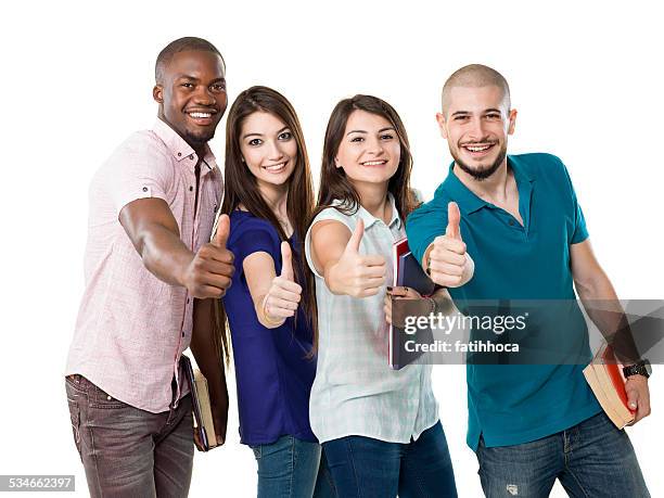 vier college-studenten - black thumbs up white background stock-fotos und bilder