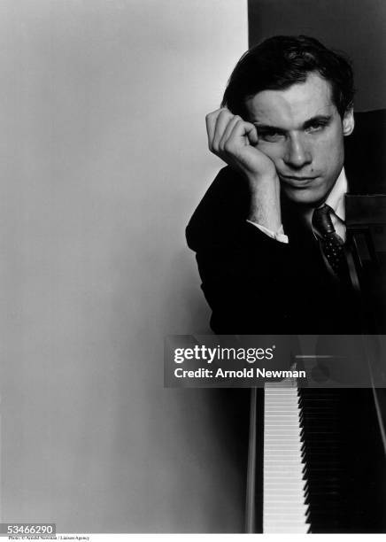 Classical pianist Glenn Gould poses for portrait with his piano October 10, 1959 in New York City.