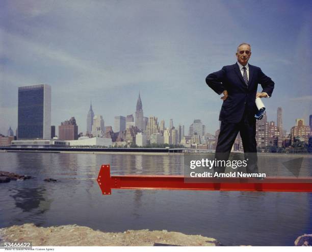 Master city planner Robert Moses stands on beam over the East River on Roosevelt Island June 4, 1959 in New York City.