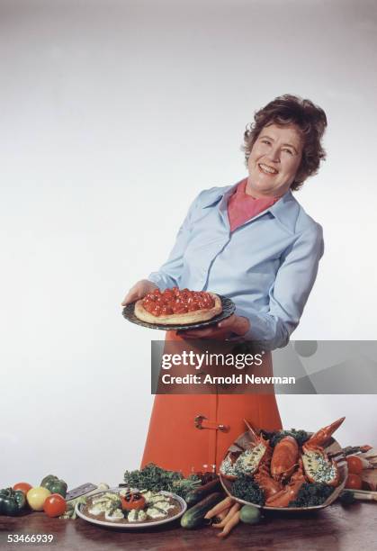 Julia Child poses for a cover shoot for McCalls Magazine April 11, 1970 in Cambridge, Massachusetts.