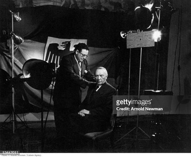 Photographer Arnold Newman prepares to photograph Konrad Adenauer, first Federal Chancellor of West Germany & leader of the Christian Democratic...