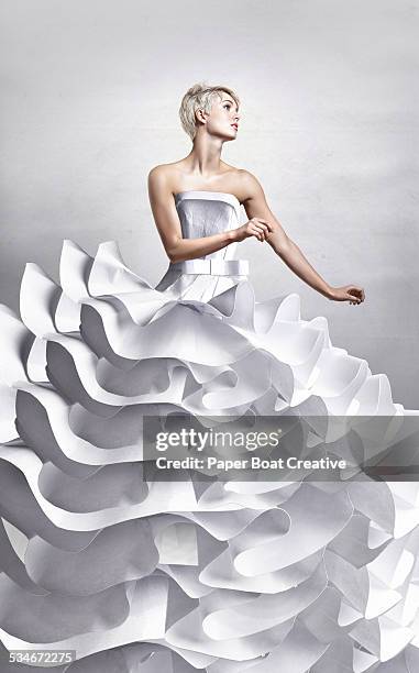 pretty lady in long white papercraft elegant dress - europe bride stock-fotos und bilder