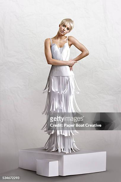 beautiful lady in long white paper craft dress - evening gown stock pictures, royalty-free photos & images