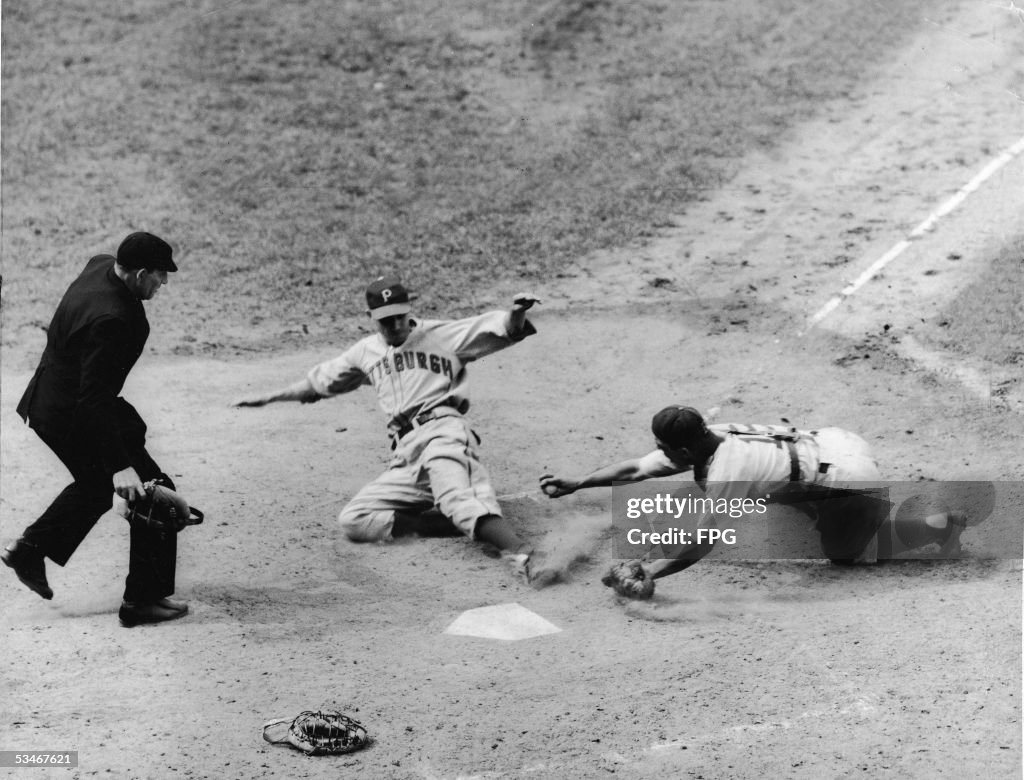 Brooklyn Dodgers Catcher Bobby Bragan Misses Tagout Of Pittsburgh Pirates Batter Vince DiMaggio