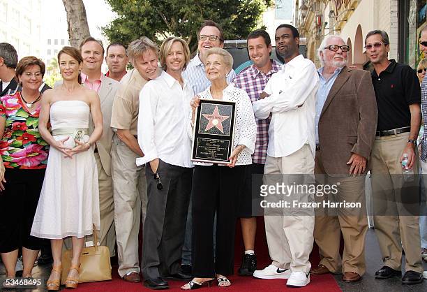 Friends and family of Chris Farley pose with Mary Anne Farley , Chris Farley's mother, and actors Julie Warner, Gary Busey, David Spade, Tom Arnold,...