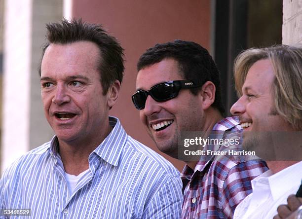 Actors Tom Arnold, Adam Sandler and David Spade attend the Hollywood Walk of Fame Star ceremony for actor Chris Farley, who was honored with a star...