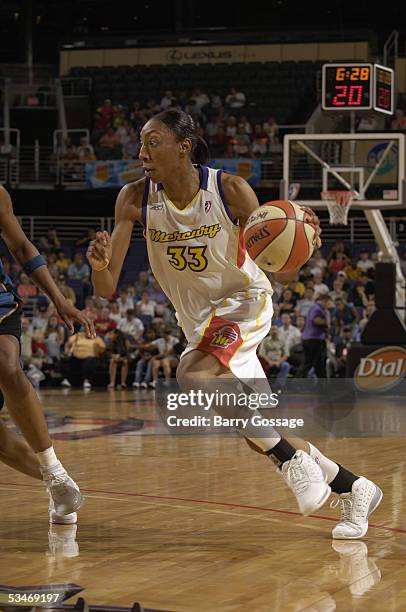 Angelina Williams of the Washington Mystics drives during a WNBA game against the Phoenix Mercury at America West Arena on July 15, 2005 in Phoenix,...