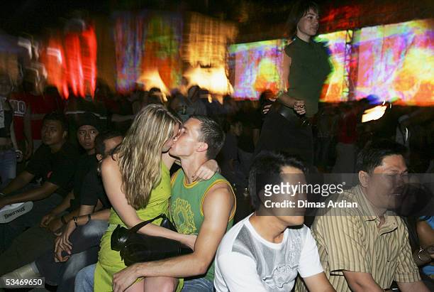 Clubbers attend a large dance party at GWK Cultural Park early August 27, 2005 in Jimbaran, Bali, Indonesia. Bali?s nightclub scene is starting to...
