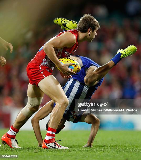 Nick Smith of the Swans and Daniel Wells of the Kangaroos in action during the 2016 AFL Round 10 match between the Sydney Swans and the North...