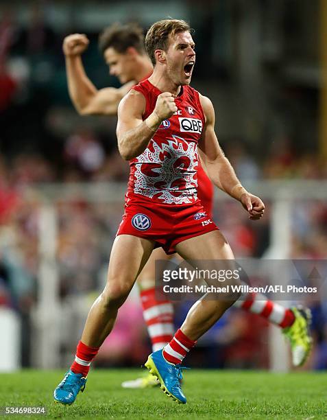 Ben McGlynn of the Swans celebrates a goal during the 2016 AFL Round 10 match between the Sydney Swans and the North Melbourne Kangaroos at the...