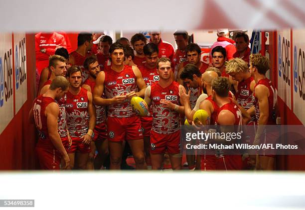 The Swans prepare to run out during the 2016 AFL Round 10 match between the Sydney Swans and the North Melbourne Kangaroos at the Sydney Cricket...