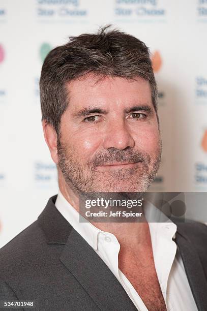 Simon Cowell arrives for Star Chase Children's Hospice Event at The Dorchester on May 27, 2016 in London, England.