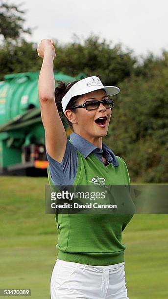 Catherine Zeta-Jones of Wales reacts after her shot to the 18th green during The Nearest to the Pin Charity Challenge prior to the official photocall...