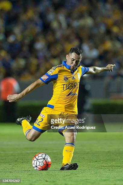 Israel Jimenez of Tigres kicks the ball during the Final first leg match between Tigres UANL and America as part of the Concacaf Champions League...