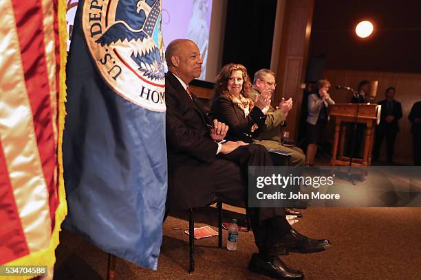 Secretary of Homeland Security Jeh Johnson before a group of immigrants during a naturalization ceremony for new American citizens on Ellis Island on...