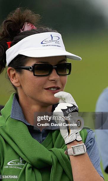 Catherine Zeta-Jones of Wales smiles on the tee during The Nearest to the Pin Charity Challenge prior to the official photocall for the All-Star Cup,...