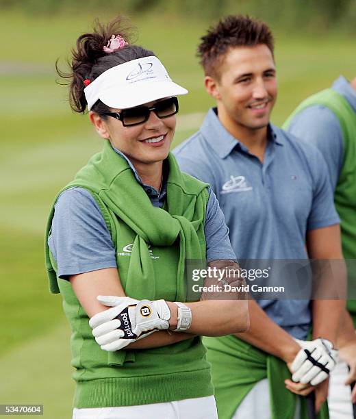 Catherine Zeta-Jones of Wales on the tee with Gavin Henson of Wales during The Nearest to the Pin Charity Challenge prior to the official photocall...