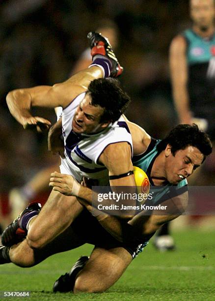 Antoni Grover of the Dockers and Troy Chaplin of the Power in action during the round 22 AFL match between the Port Adelaide Power and Fremantle...