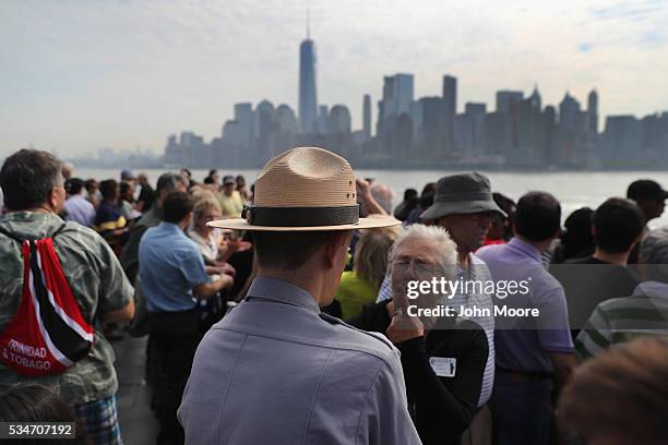 Park ranger answers questions while in route to Ellis Island on May 27, 2016 in New York City. U.S. Secretary of Homeland Security Jeh Johnson...
