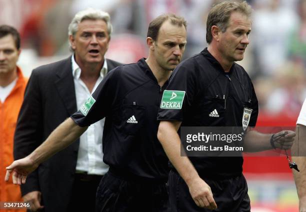 Coach Uwe Rapolder of Cologne shoots to Referee Helmut Fleischer after the Bundesliga match between 1.FC Cologne and 1.FC Kaiserslautern at the Rhein...