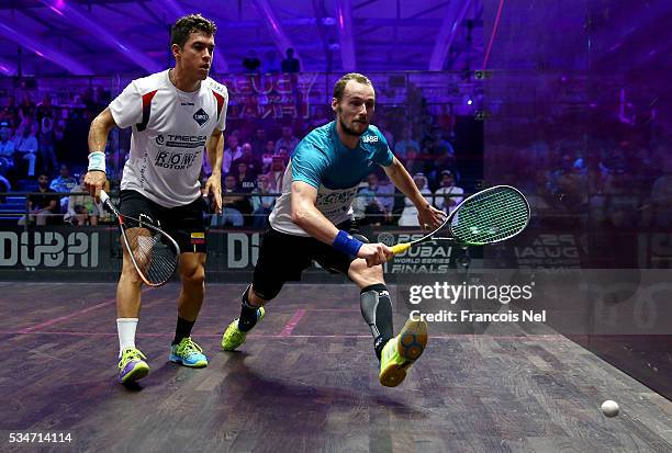 Gregory Gaultier of France competes against Miguel Angel Rodriguez of Colombia during day four of the PSA Dubai World Series Finals 2016 at Burj Park...