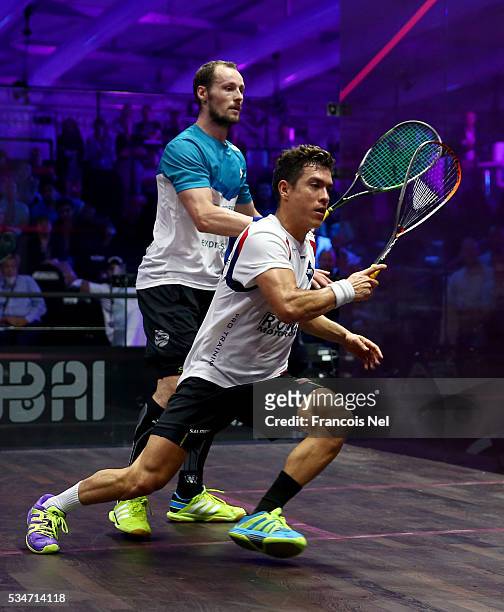 Gregory Gaultier of France competes against Miguel Angel Rodriguez of Colombia during day four of the PSA Dubai World Series Finals 2016 at Burj Park...