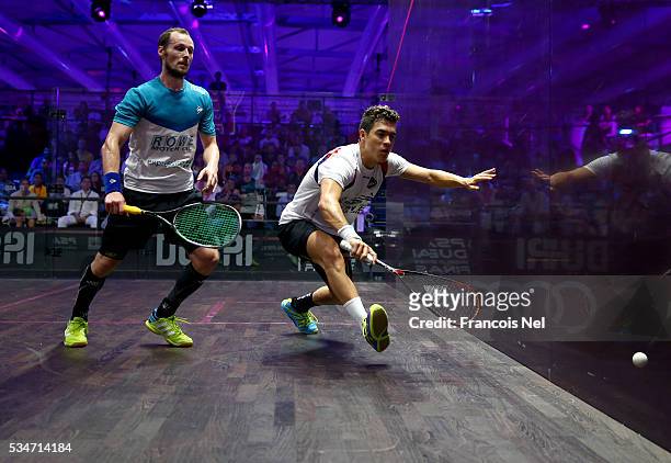 Gregory Gaultier of France competes against Miguel Angel Rodriguez of Colombia during day four of the PSA Dubai World Series Finals 2016 at Burj Park...