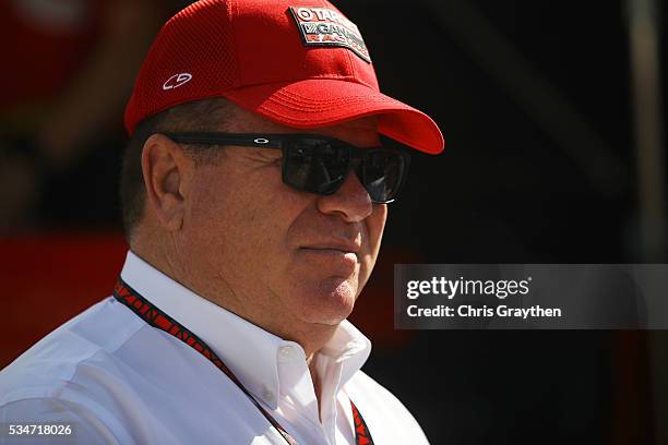 Team owner Chip Ganassi looks on as drivers perpare on Carb Day ahead of the 100th running of the Indianapolis 500 at Indianapolis Motorspeedway on...
