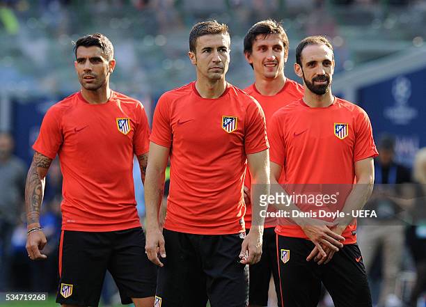 Lucas Hernandez, Gabi Fernandez, Stefan Savic and Juanfran look on during an Atletico de Madrid training session on the eve of the UEFA Champions...