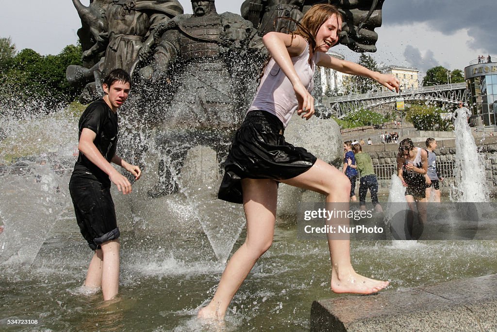 Ukrainian students celebrate the end of the school term