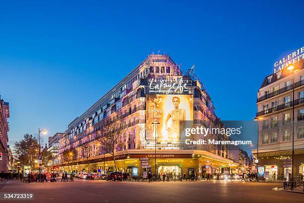 lafayette galleries during the christmas period - galeries lafayette paris stock pictures, royalty-free photos & images