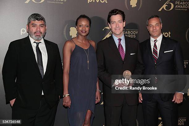 Segment Producer for "Real Sports With Bryant Gumbel: The Killing Fields," HBO, Chapman Downs holds the Peabody Award in the press room during the...