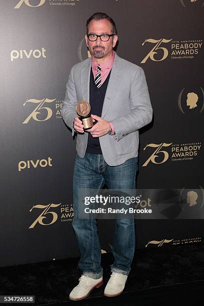 With the Peabody Award for 'The Jinx: The Life and Deaths of Robert Durst', director/producer Andrew Jarecki poses in the press room during the 75th...