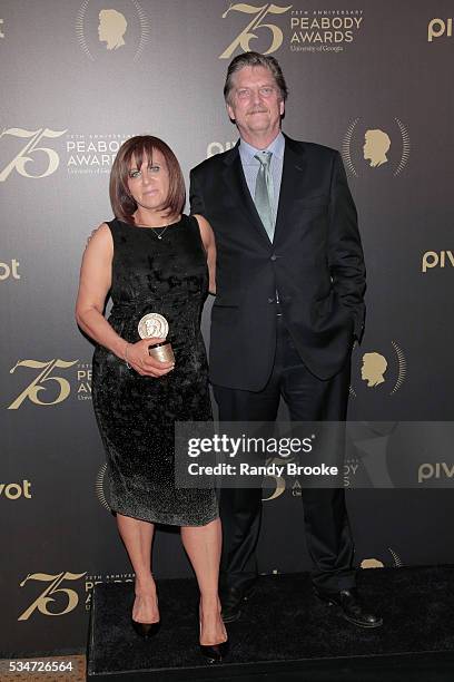 Producer Sally Angel and Director Andre Singer with the Peabody Award for "Night Will Fall' in the press room during the 75th Annual Peabody Awards...