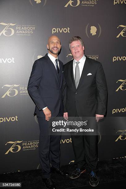 Dr. Jeffrey P. Jones, Director, George Foster peabody Awards, the University of Georgia and Host Keegan-Michael Key in the press room during the 75th...