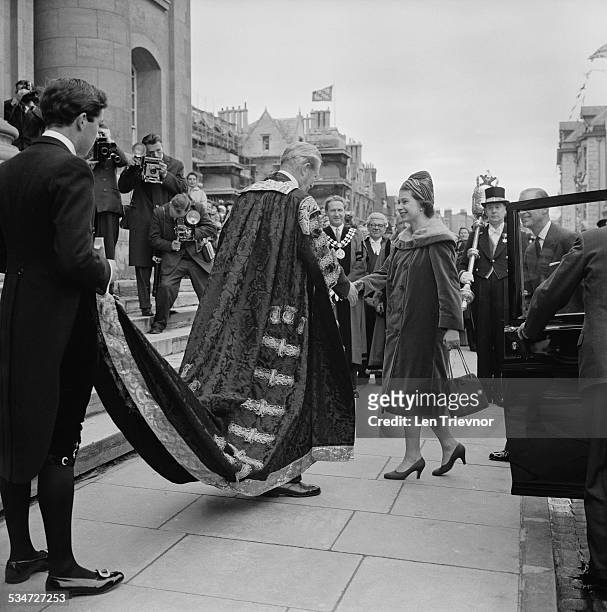 Queen Elizabeth II and Prince Philip, Duke of Edinburgh arrive at St Catherine's College to lay a foundation stone, Oxford, 1960.
