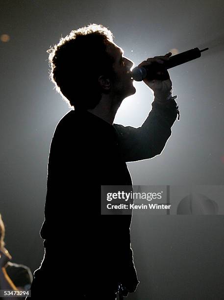 Cold Play's Chris Martin performs on stage during rehearsals for the 2005 MTV Video Music Awards at the American Airlines Arena August 27, 2005 in...